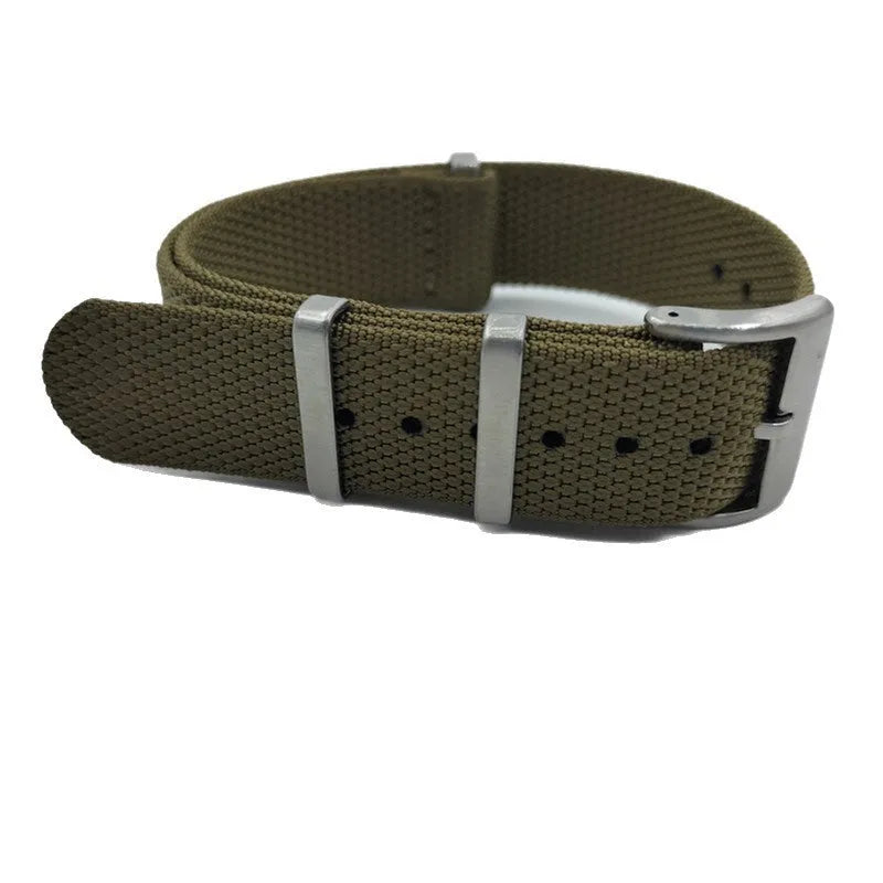 Nylon integrated watch strap in army green colour, showing the textile weave and buckle.
