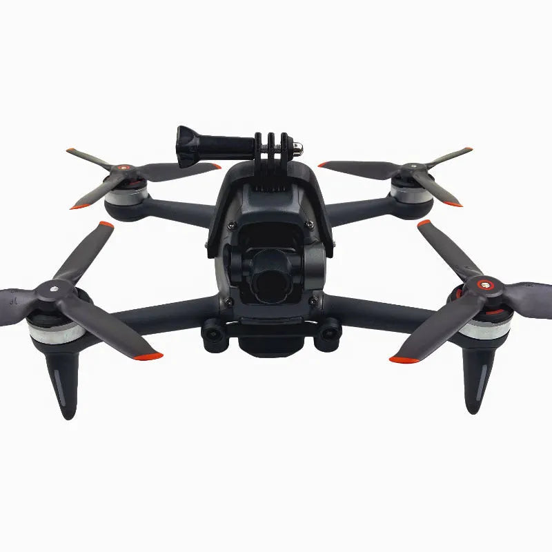3D-printed hard plastic FPV drone top expansion bracket with soft sponge pad for mounting GoPro cameras.