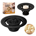 Black Jinkali four-piece set of steamed bun and dumpling moulds on a kitchen surface
