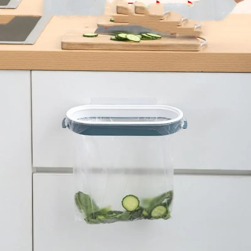 Blue plastic kitchen garbage bag storage rack for organising bin liners inside a cabinet.