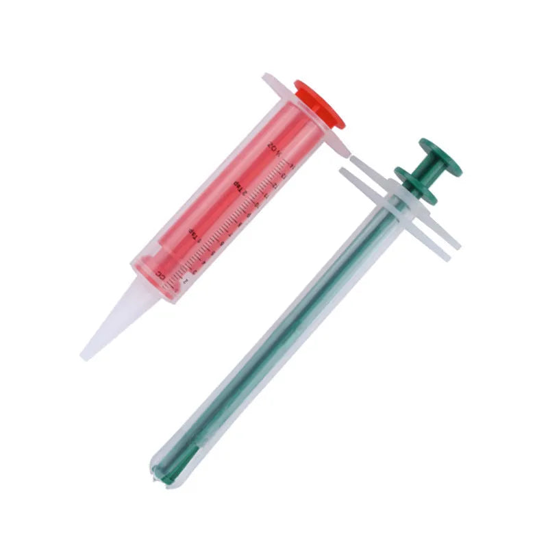 Two pet pill shooter tools with soft silicone tips for medicine feeding to cats and dogs