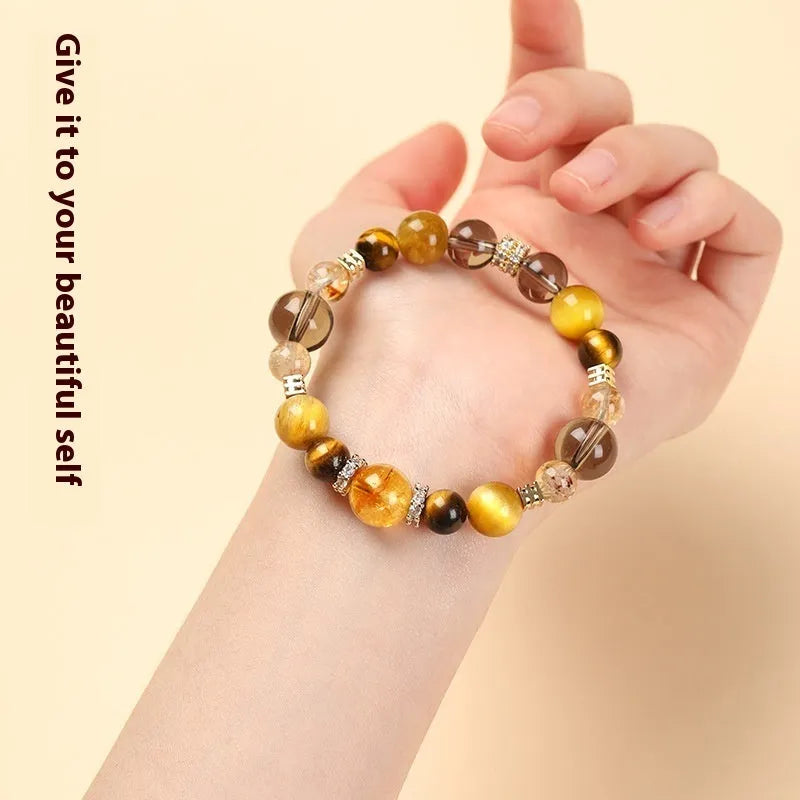 Lucky Jinba natural tiger-eye crystal bracelet with geometric beads in yellow tower style.