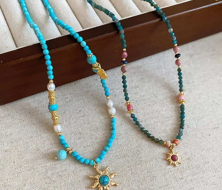 Freshwater pearl sun necklace with geometric pendant in French royal court style, blue and gold-blue-pink electroplated finishes