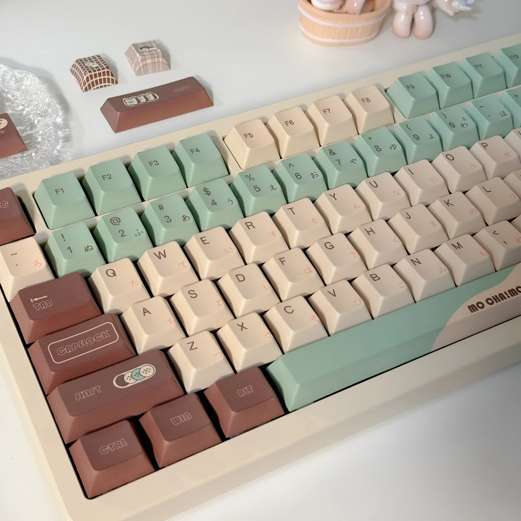 Matcha coloured mechanical keyboard key caps with cross satellite shaft design for switch compatibility