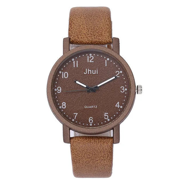 Ladies quartz wrist watch with round metal case, 20mm dial, and resin strap in red