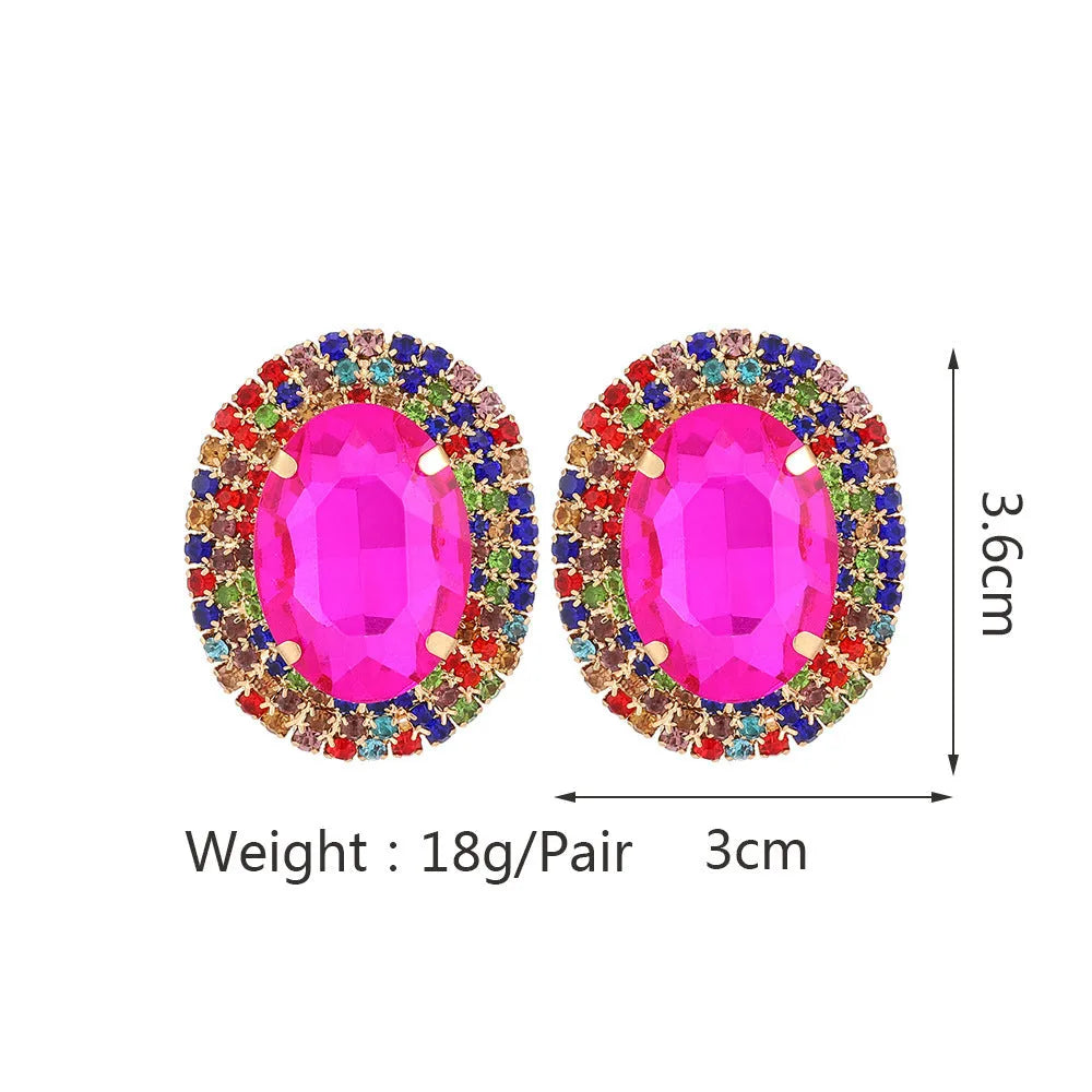 Women's oval rhinestone ear studs in eight colours including red, green, purple, black, white, pink, champagne, and AB finish