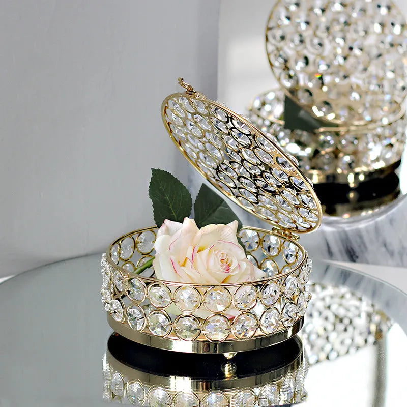 French gold iron frame transparent crystal glass jewelry storage box on a table