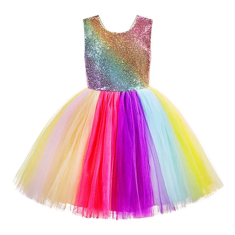Girls cute rainbow skirt with lace and mesh layers, seven colours, 100% polyester outer, 80% cotton lining, available in sizes up to 160cm