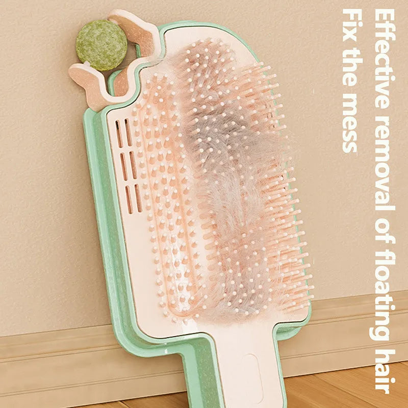 PP plastic pet scratching groomer with mint-scented ball and feather attachment on textured base