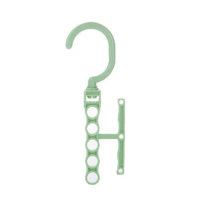 Blue revolving wardrobe hanger with five arms and a central handle for space-saving clothes storage.