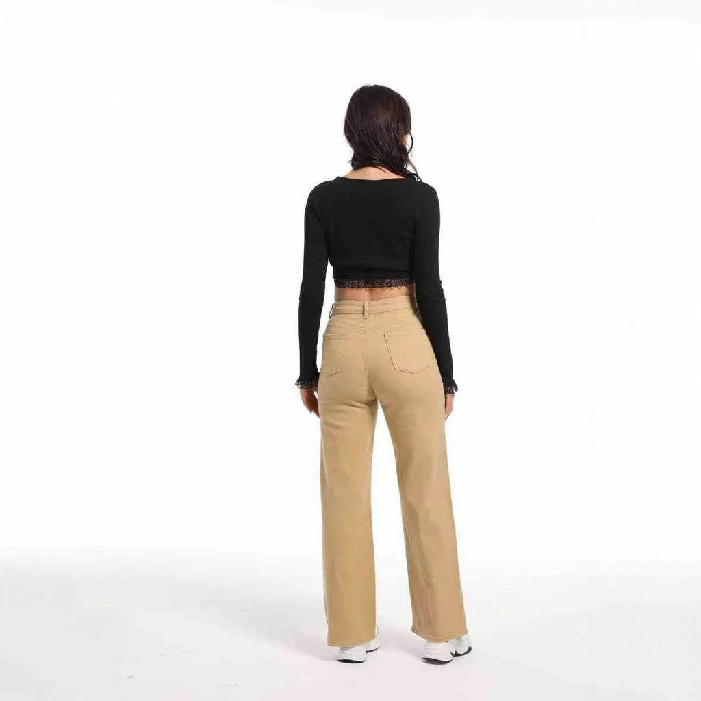Women's high-waist straight wide-leg jeans in apricot colour on a hanger.