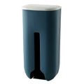 Wall-mounted plastic bag storage box in Nordic green with top flip lid and bottom extraction slot