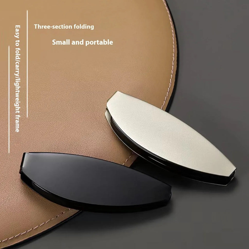 Black folding presbyopic glasses with retro ring-style frame, shown open and collapsed.