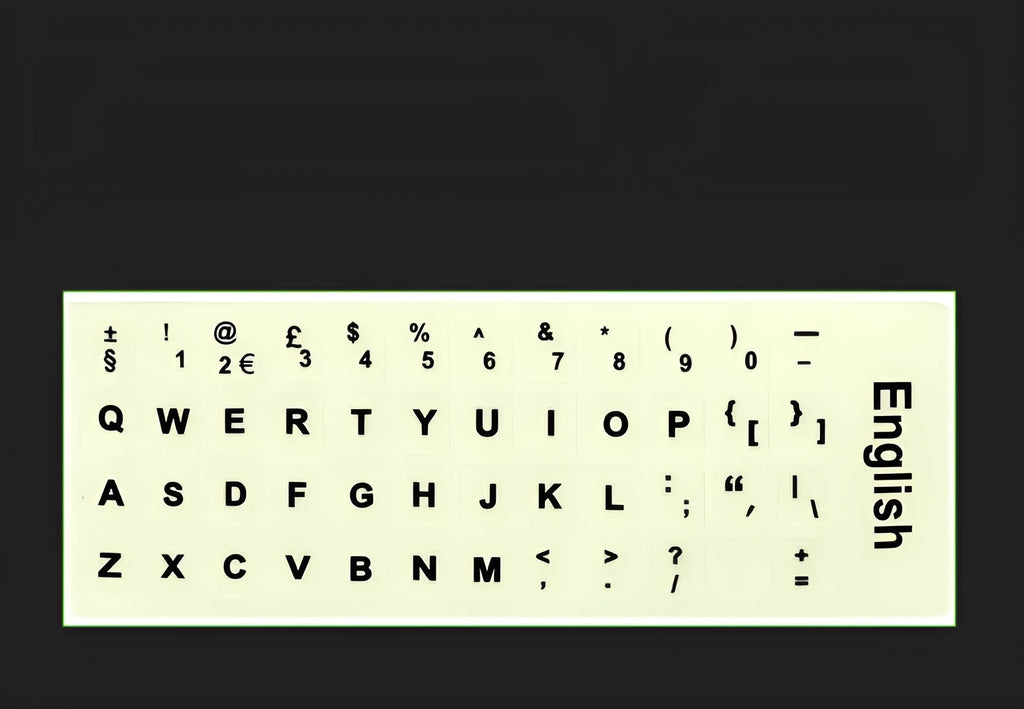 Glowing yellow multilingual keyboard stickers showing Arabic, Thai, Hebrew, French, Italian and German characters