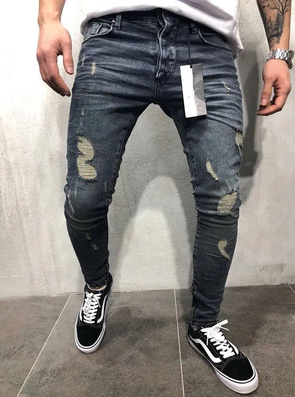 Men's gray blue stretch biker jeans with hole details, slim fit, on a model