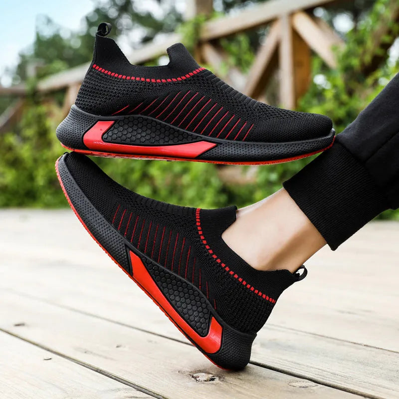 Men's striped mesh slip-on sneakers with flyknit upper in black and white colour option