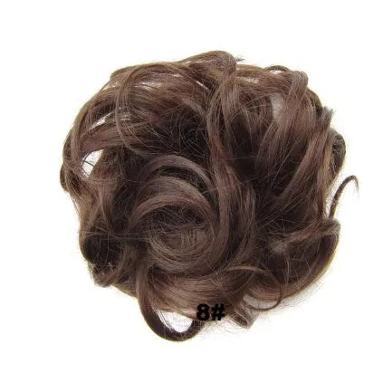 Adjustable hair ring in a natural black shade for creating hair buns and ponytails