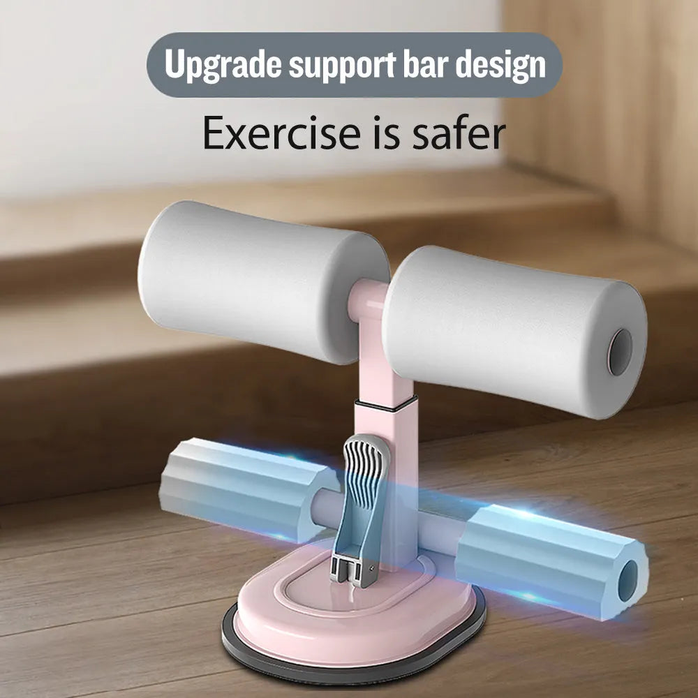 Pink adjustable sit-up bar floor assistant, 27x21cm, with foam padding and suction base
