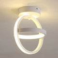 Modern round ceiling light in black or white with 21cm diameter and LED light source