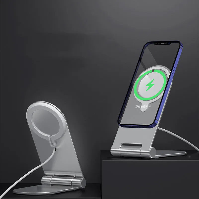 Silver vertical adjustable magnetic phone bracket for iPhone 12 on a car dashboard.