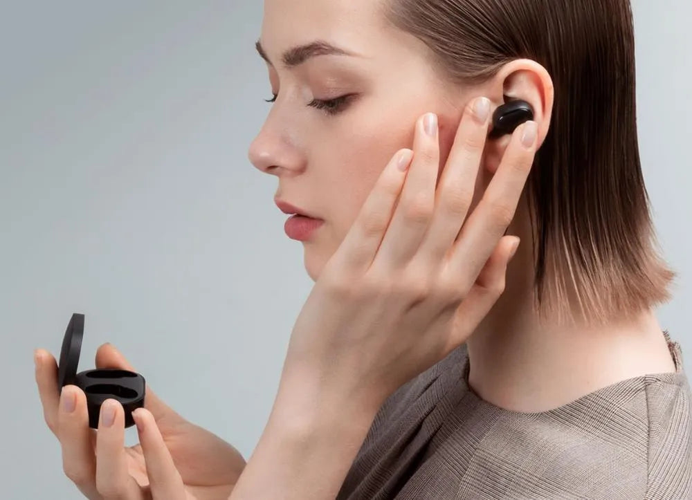 Redmi AirDots 2 black true wireless earbuds and charging case.
