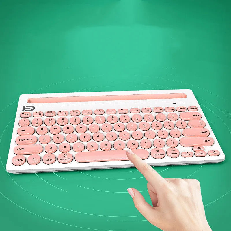 Wireless Bluetooth keyboard in black, compact 297x178x22mm size, slim profile on desk