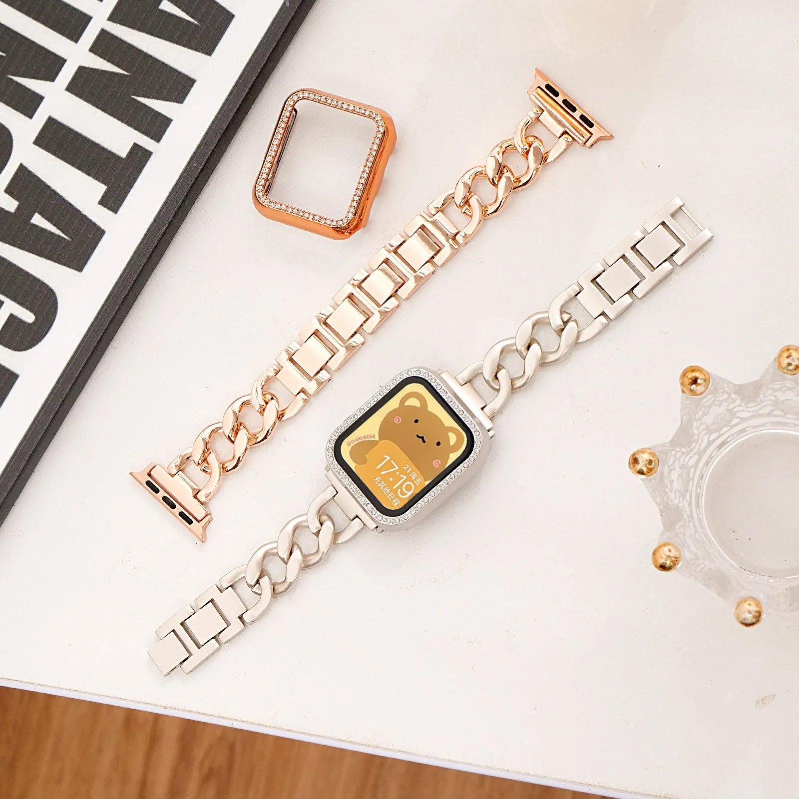 Metal denim chain Apple Watch strap in silver, black, gold, rose gold, and Starlight colours showing textured design