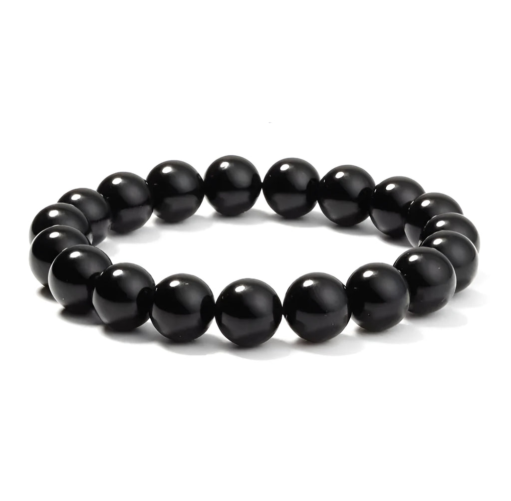 Women's geometric black agate bracelet with elastic cord, shown in 8mm bead size.