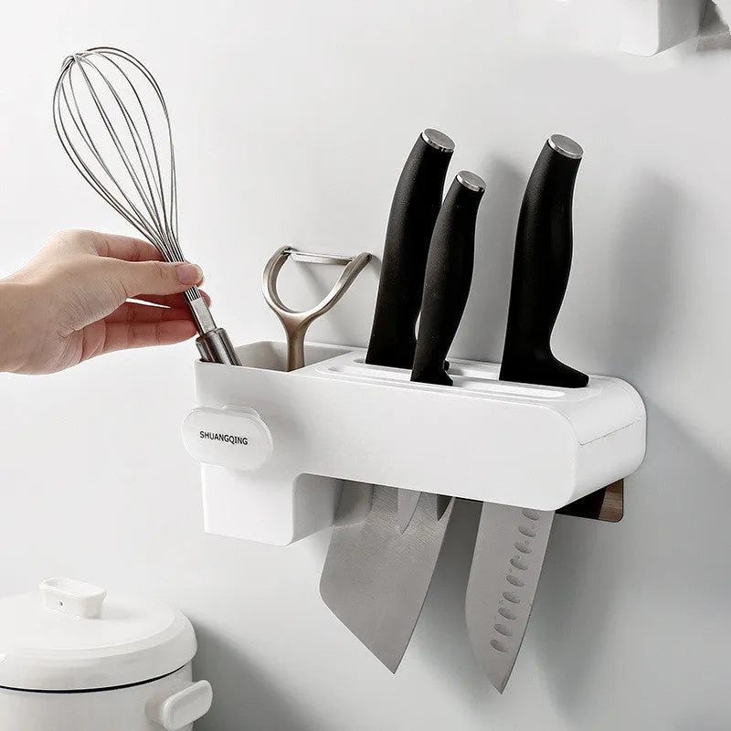 White plastic kitchen knife rack with modern simple design placed on countertop