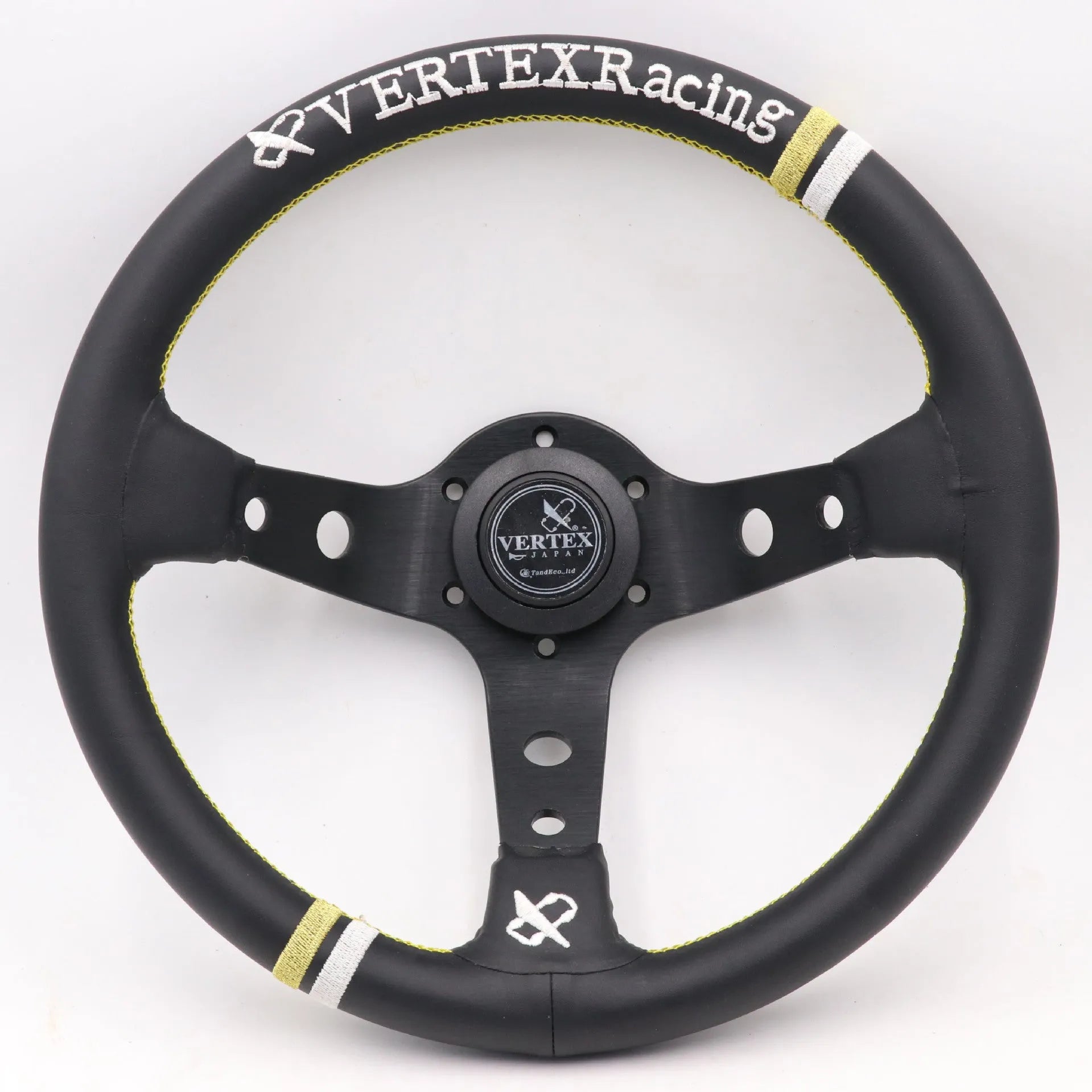 Black alloy racing steering wheel with deep concave rim and star embroidery pattern.
