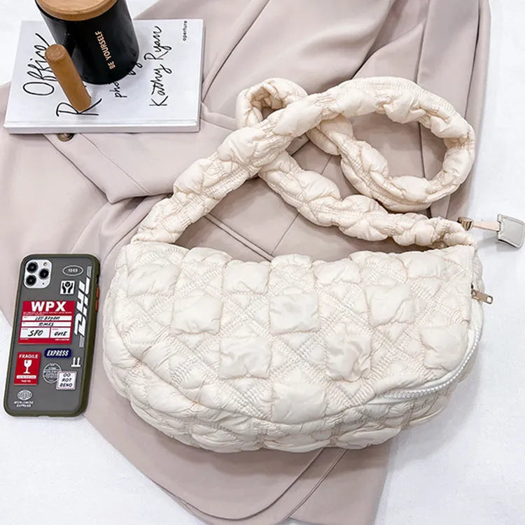 Light beige women's casual nylon shoulder messenger bag with a long adjustable strap.