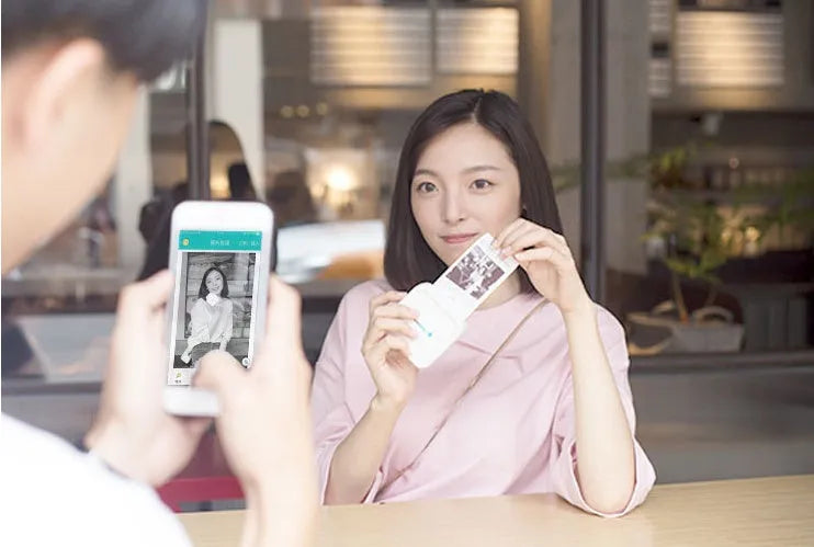 Thermal pocket portable Bluetooth printer in white with 79x79x40mm dimensions and 900mAh battery