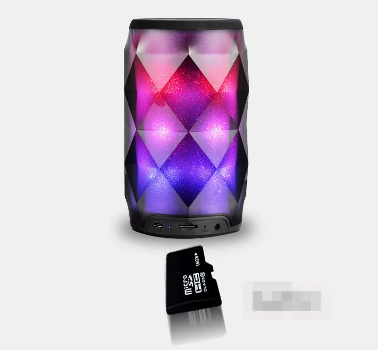Black crystal-cut Coke can shaped Bluetooth speaker with colourful LED starry sky lighting effects.