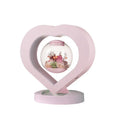 Pink preserved rose decorative ornament with optional base and Bluetooth audio functionality