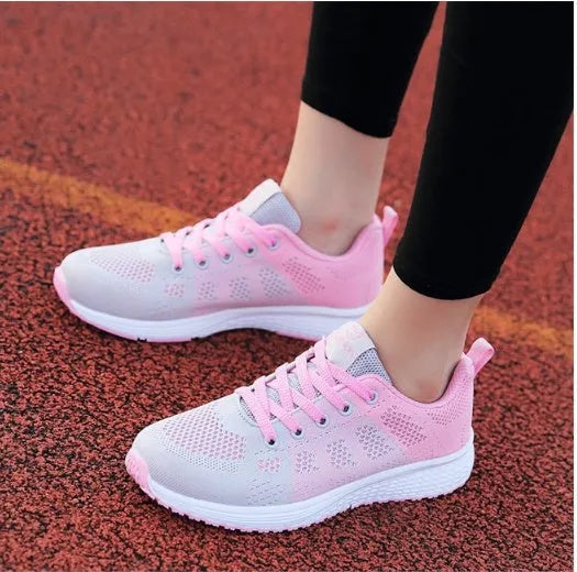 Women's breathable mesh flat heel sports shoes available in black, pink, and rose red colours