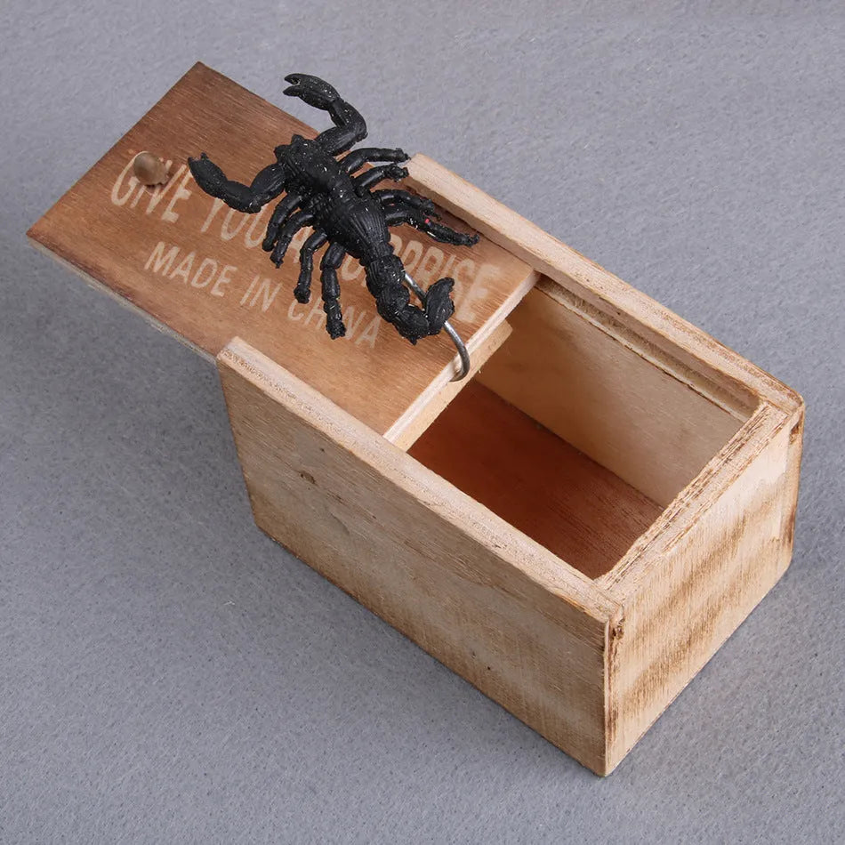 Wooden prank scare box with lifelike jumping animal for April Fools' Day tricks