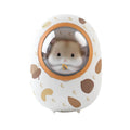 White Hamster hand warmer and power bank unit showing compact dual-function design.
