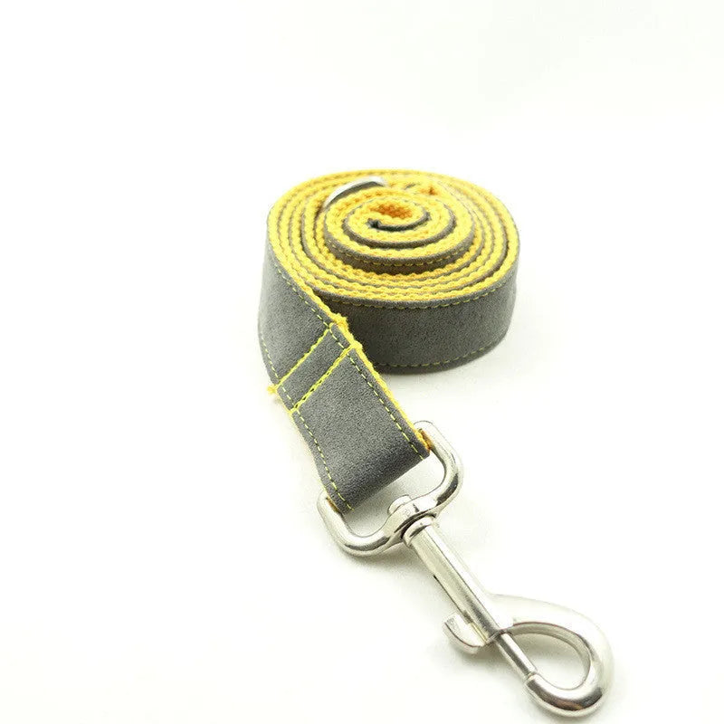 Grey and yellow polyester dog leash on plain background, available in multiple sizes from XS to XL