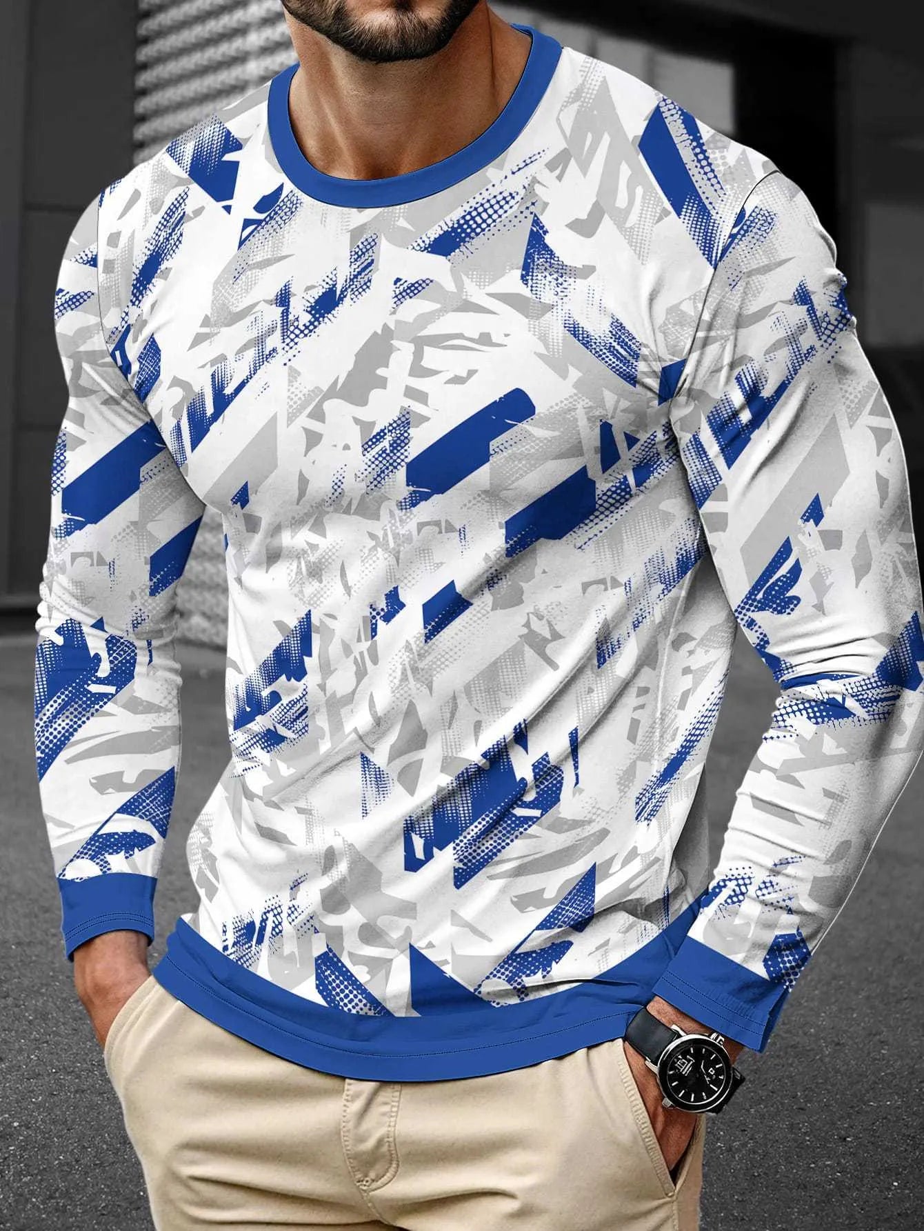 Man wearing a milk silk long sleeve pullover top with a round neck in a casual setting.
