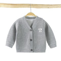 Baby girls cotton cardigan in blue with long sleeves and single-breasted closure, soft treatment finish