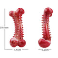Red natural rubber dog chew toy with raised nodules for aggressive chewers