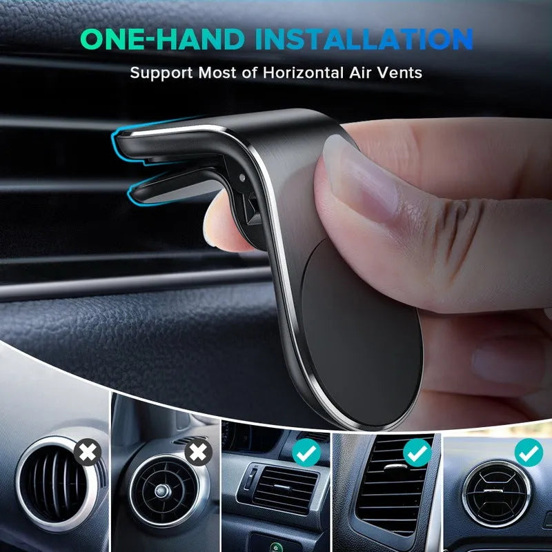 Black universal car phone holder bracket mounted on a car dashboard holding a smartphone.