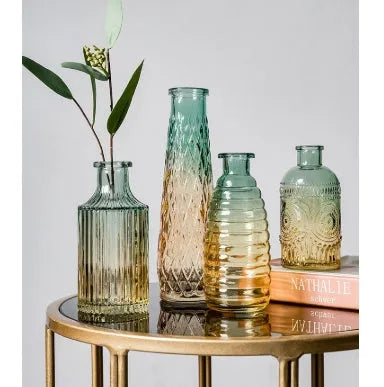 Set of five clear glass vases with colourful electroplated finish and thicker stable bottoms in various sizes