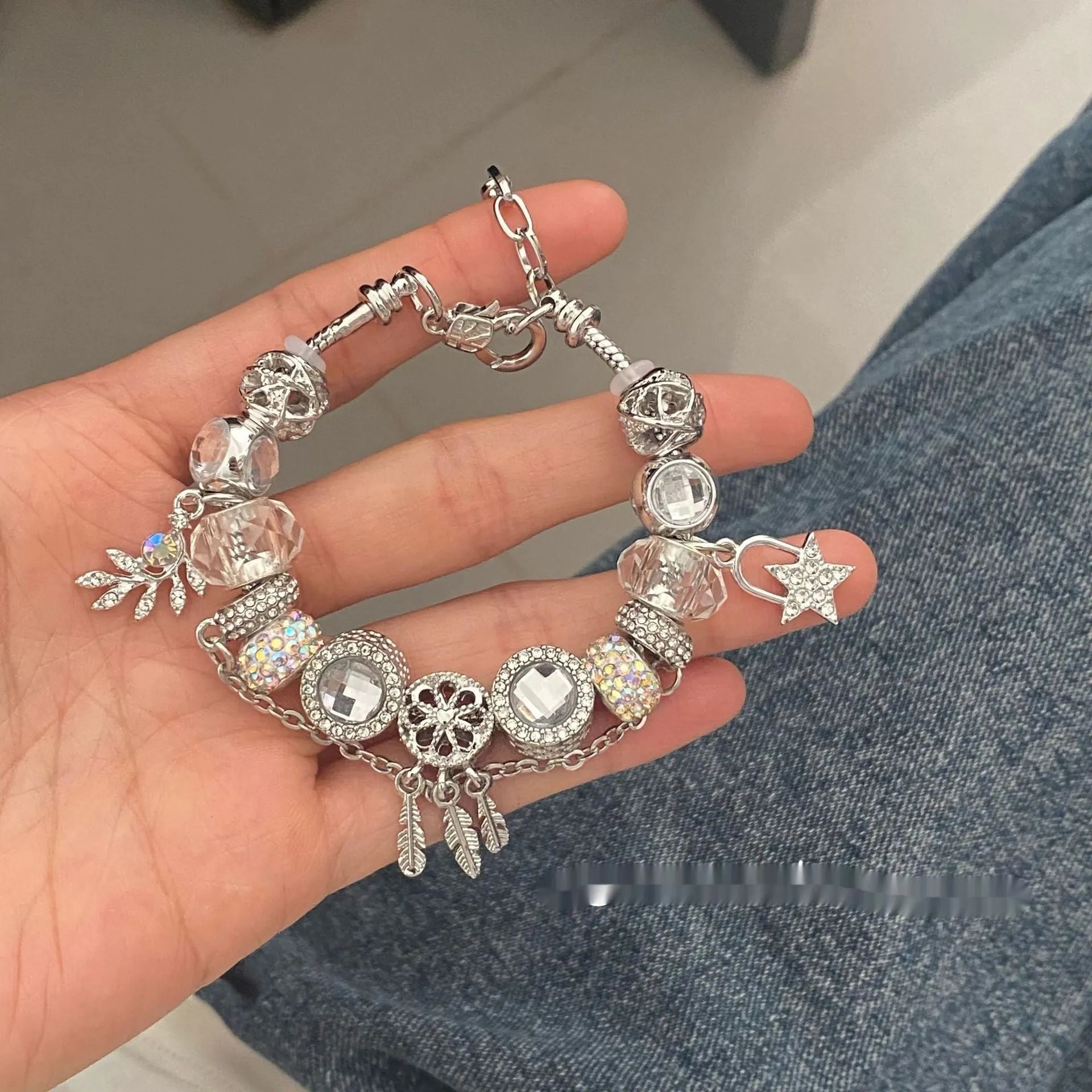 Women's dreamcatcher bracelet with colourful crystals, star shape, electroplated mixed material finish