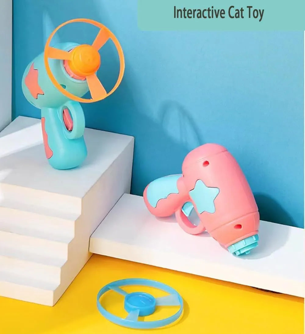 Blue interactive cat toy gun with spinning Frisbee launcher for indoor feline play