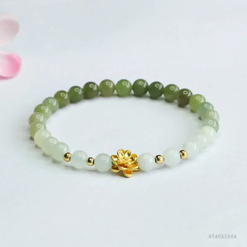 Ancient style jade bracelet with clear water gradient colour and lotus flower design