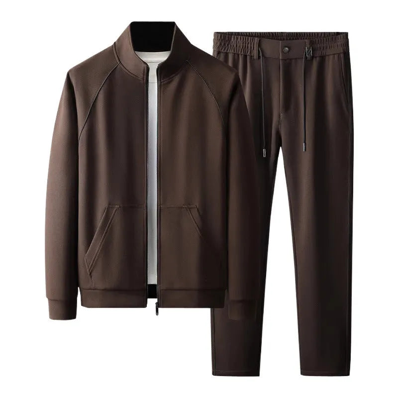 Men's slim fit stand collar tracksuit set in Vinylon fabric shown in black colour.