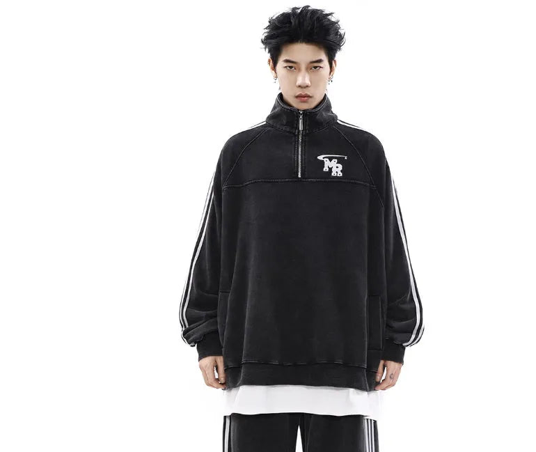 Black Hong Kong style retro hoodie with a stand collar on a hanger