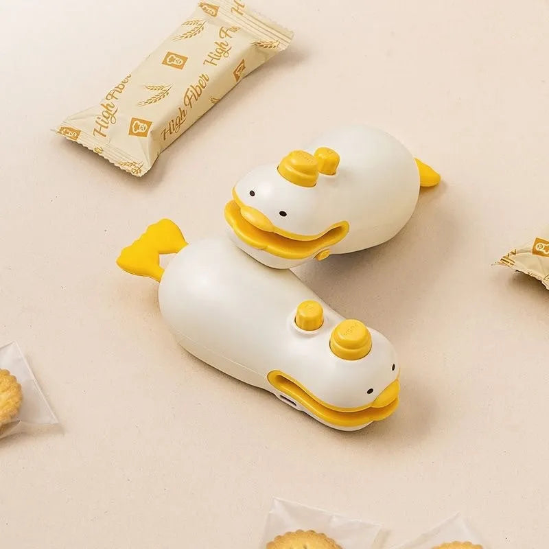 Small yellow duck animal jacquard design rechargeable handheld sealing machine with charging cable