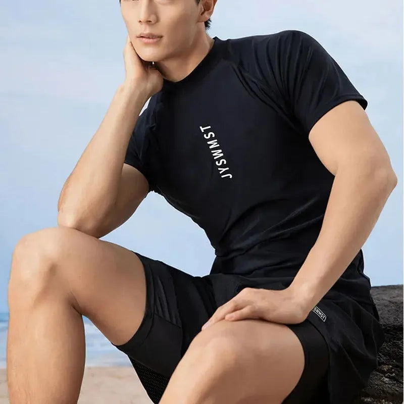 Men's patterned plus size swimsuit set with matching top and trunks on a mannequin.